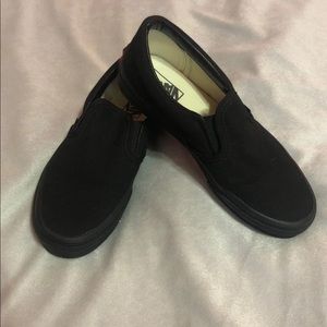 Black vans slip on